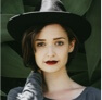 the face of Julia, a young lady with a harry potter hat 